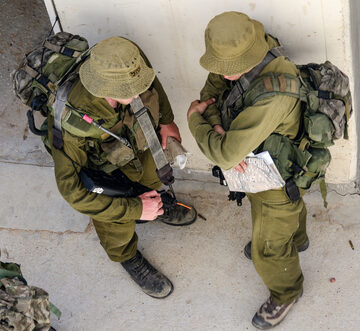 ISRAEL RAIDS AND RANSACKS HUMAN RIGHTS GROUPS AND CHURCH