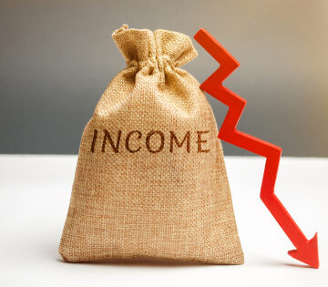 Money,Bag,With,Word,Income,And,Down,Arrow.,Reduced,Revenue AMERICANS’ INCOMES DOWN AS INFLATION GOES UP