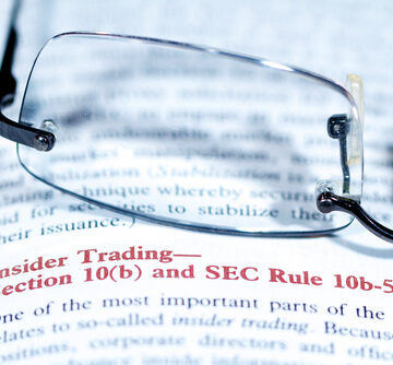 Close,Up,View,Of,A,Business,Word,Definition,In,A FED’S INSIDER TRADING BANDITS GET FREE RIDE