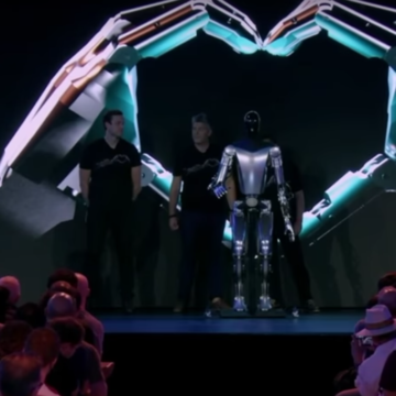 MUSK TAKES STAGE WITH OPTIMUS HUMANOID ROBOT