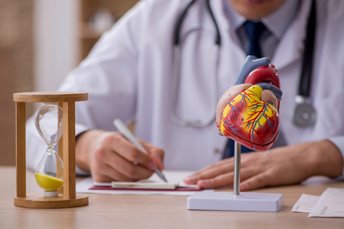 Young,Male,Doctor,Cardiologist,In,Time,Management,Concept NEW EURO STUDY SAYS COVID SHOTS ADD UP TO HEART DAMAGE AT MUCH HIGHER RATES THAN CLAIMED