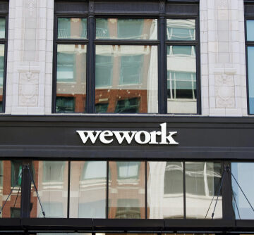 WEWORK RACING TO TURN A PROFIT