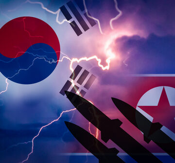 South Korea and North Korea flags and missiles