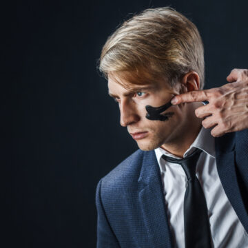 Businessman,With,War,Paint,On,His,Face.,Risk,Management,Concept. CENTRAL BANKS HAVE DECLARED WAR ON WE THE PEOPLE OF THE WORLD