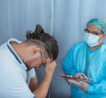 Doctor and distressed patient