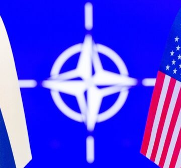 U.S. and Russian flags and compass