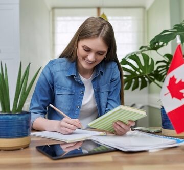 Online,Training,,Female,Teenager,Sitting,At,Home,Looking,At,Webcam, Canadian office worker