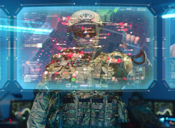 Medium,Shot,Of,A,Soldier,Checking,Interactive,Holographic,Map Soldier checking interactive, holographic map