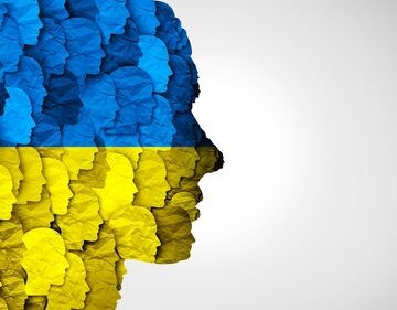 Ukrainian,People,Symbol,As,A,Group,Of,Ukrainians,Together,With Graphic of Ukrainian colors and people