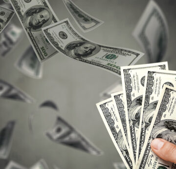 Sad,Man,Looking,At,His,Wallet,With,Money,Dollar,Banknotes SPOTLIGHT: BYE, BYE BUCKS—THE DEATH OF THE DOLLAR