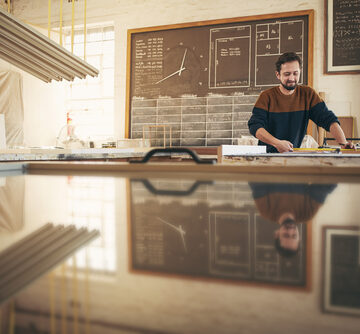 Professional Craftsman Working With Skill Saw