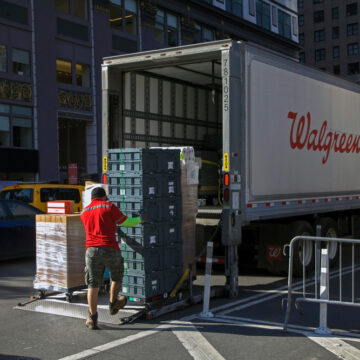 Worker Loading Truck In NYC