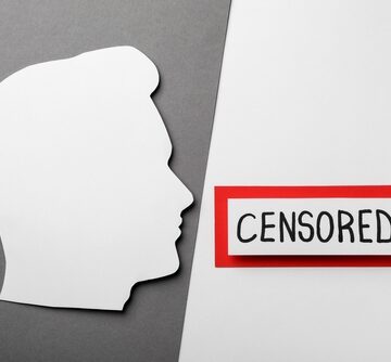 Card With Word Censored And Man's Head Cutout/Silhouette