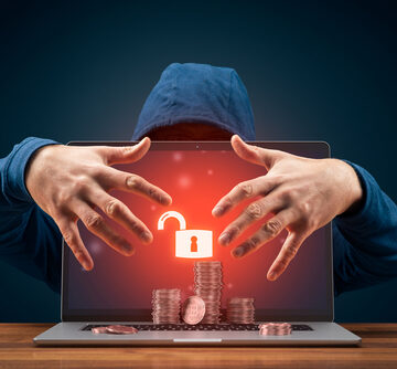 Bitcoin,And,Cryptocurrency,Cybersecurity,Concept,With,Hacker,Behind,The,Unsecured BLOCKCHAIN BATTLES