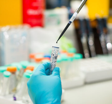 Laboratory,Scientist,Working,At,Lab,With,Test,Tubes,Coronavirus/covid-19/,Science Laboratory Scientist Working With Test Tubes