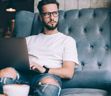 Daydreaming Man Working From Home