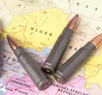 Conceptual Image Of Four Bullets On Geographical Map Of Niger