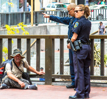San Francisco Police Officers Dealing With a Homeless Person