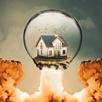 Concept Image Of Rising House Prices With House Taking Off Like A Missile