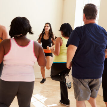 Fitness Instructor And Class Of Overweight People