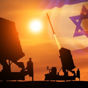Silhouette Of Air Defense System With Israeli Flag In The Sky, Background