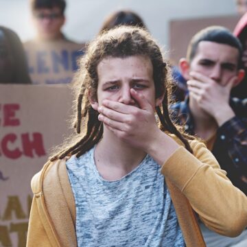 Students Protesting For Free Speech By Covering Their Mouths