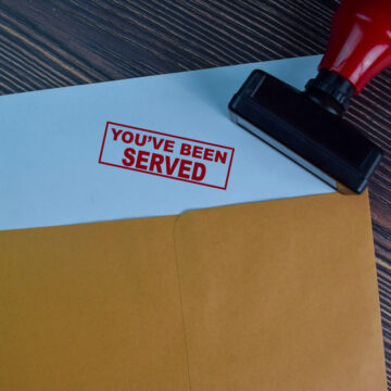 Papers In A Brown Envelope Stamped With The Words You've Been Served