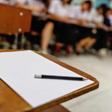 Unoccupied Desk In Classroom