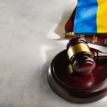 Judge's,Gavel,On,The,Book,And,The,Flag,Of,Ukraine.justice.the Judge's Gavel And Ukrainian Flag