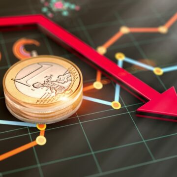Graphic Concept Of Financial, Economic, Global Crisis With A Euro And Declining Stock Graph