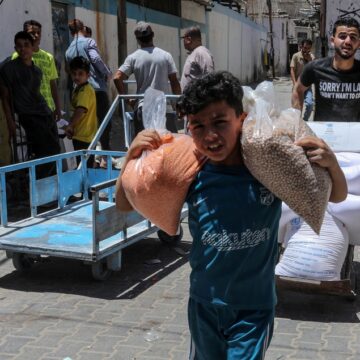Palestinians Start Receiving Food Aid At A UN Distribution Center