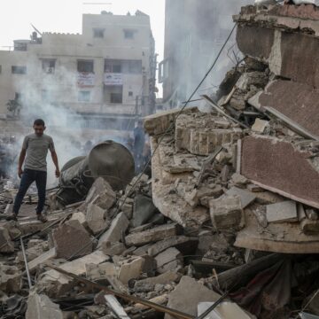 People Search The Rubble Of A Building In The Khan Yunis Municipality After An Israeli Airstrike