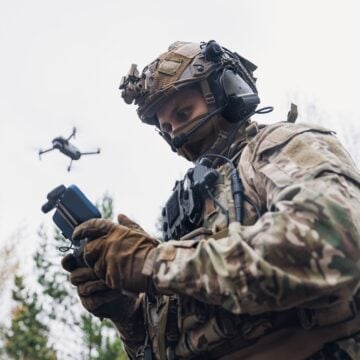 Military Soldier Controls Drone For Reconnaissance Operation