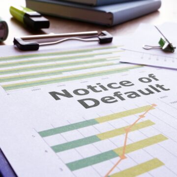 Notice Of Default Is Shown On A Clip Board