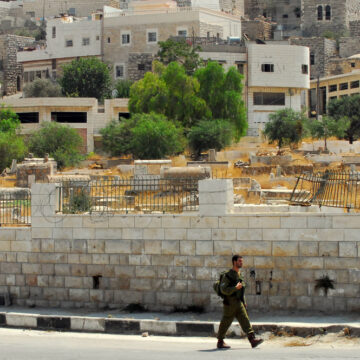 Israeli Soldier Patrols In Hebron In The West Bank, Palestine