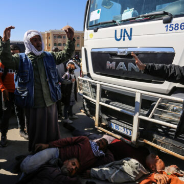 Palestinian Refugees And A UN Aid Distribution Truck