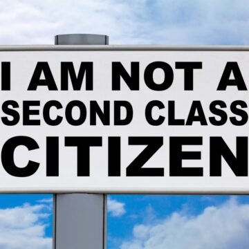Close-up,On,A,White,Billboard,Against,A,Blue,Sky,With CITIZENSHIP: NOW SECOND CLASS