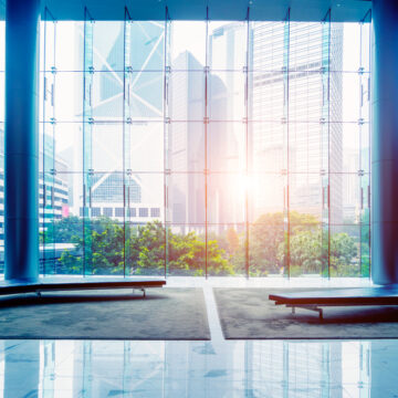 Glass,Wall,In,The,Office,Building TOP TREND 2023, OFFICE BUILDING BUST: STERNLICHT FORECASTS $1 TRILLION IN LOSSES