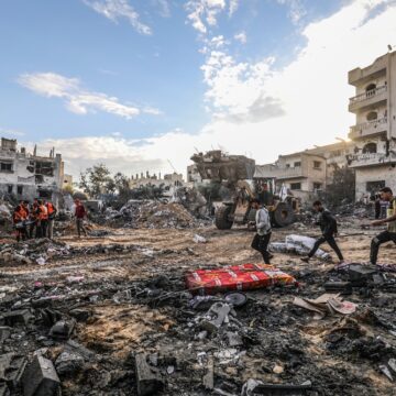 The Palestinian Civil Defense Searches For Survivors In The Rubble Of Palestinian Homes