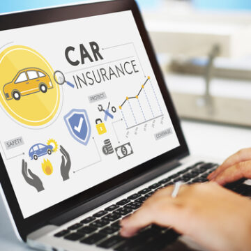 Laptop Screen With Car Insurance, Policies, Safety, Coverage, And Graphs