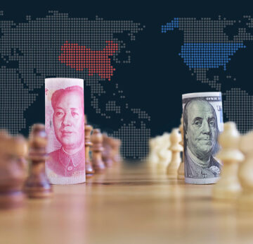 Concept With Background Of U.S., China, Trade War With Banknotes On Chess Board