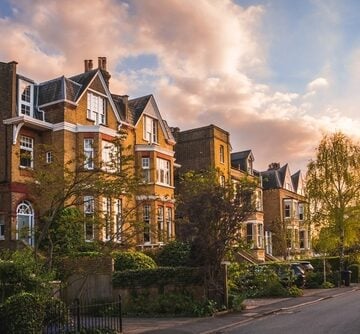View Of Traditional Residential Street In English Town At Sunset
