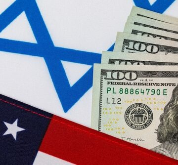 U. S. And Israel Flags With U.S. $100 Bills