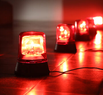 Big Red Flashing Alarm Lights In A Row