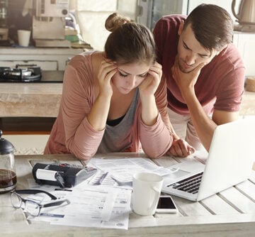 Stressed Young Couple Facing Financial Problems