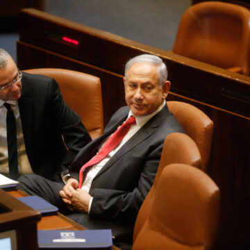Israel's Prime Minister Benjamin Netanyahu And Yariv Levin Seated In The Knesset.