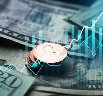 Penny Stock Investments Taking Off Concept With Pennies, Cash, and Upward Arrows