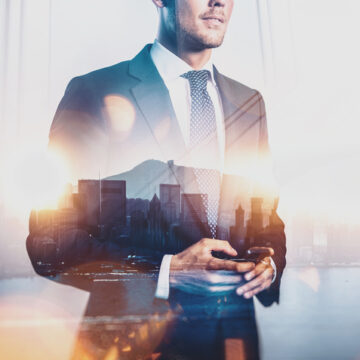 Corporate Executive Against The Backdrop Of A Major City