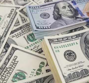 Piles Of U.S. Dollars