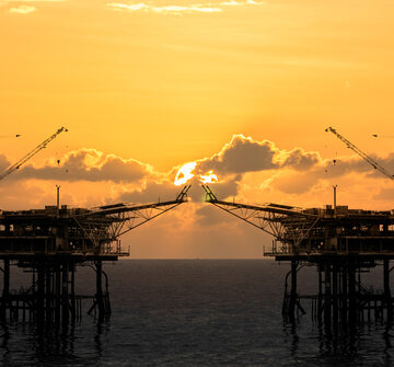 Rig,Platform,Silhouette,In,Oil,And,Gas,Industry,When,Sunset Oil Rig Platform On The Ocean At Sunset